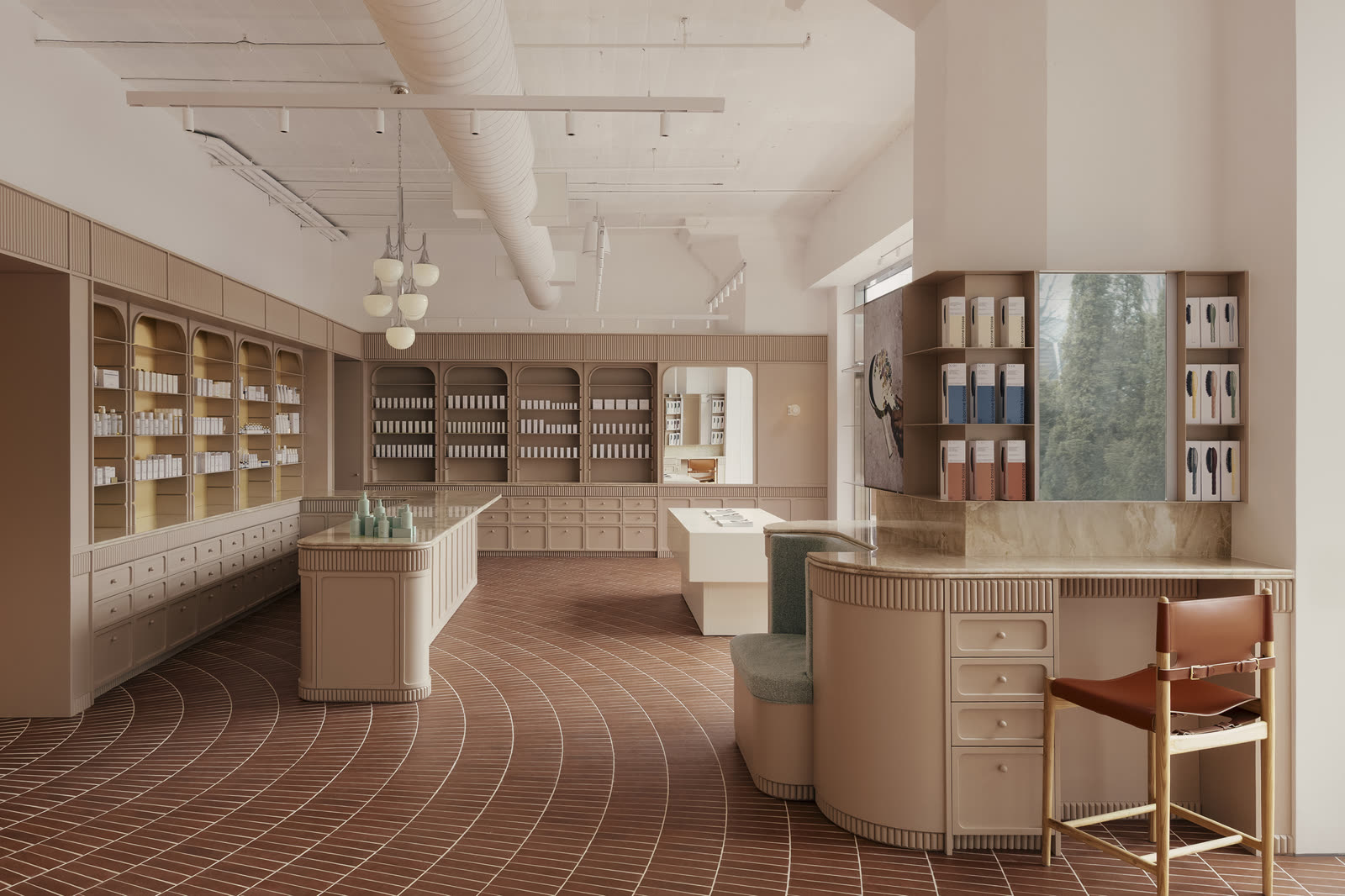 طراحی داخلی فروشگاه با کف آجری منحنی که مسیر حرکت مشتری را نشان می‌دهد، فروشگاه Living Beauty در Toronto